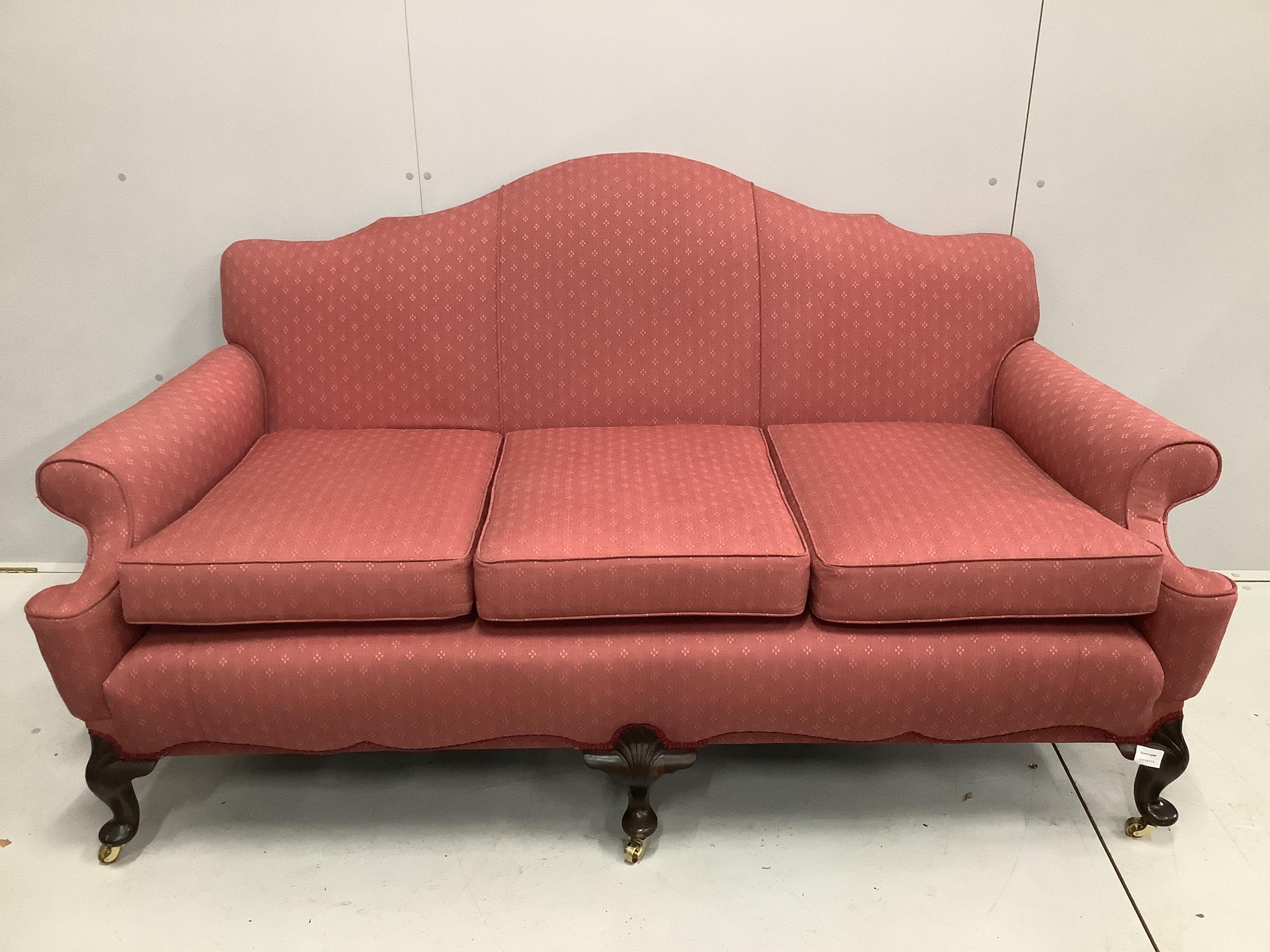 A George I style upholstered scroll arm settee, width 186cm, depth 88cm, height 94cm. Condition - good
